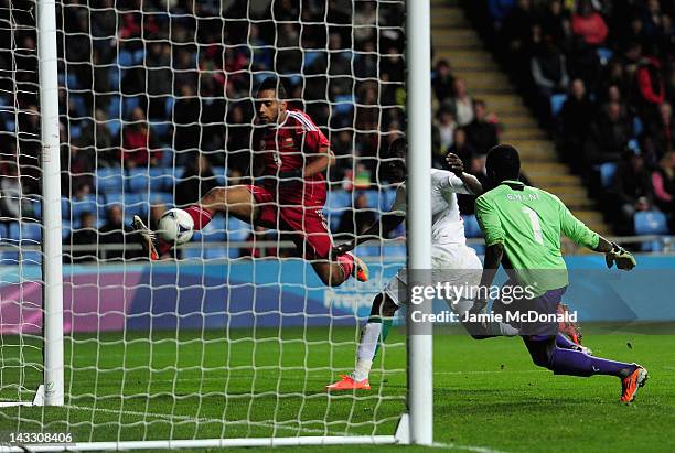 Mohammed Al Balushi of Oman misses an open goal during the London 2012 Olympic Qualifier between Senegal and Oman at Ricoh Arena on April 23, 2012 in...