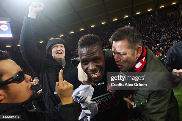 Mohamadou Idrissou of Frankfurt celebrates with the fans after the Second Bundesliga match between Alemannia Aachen and Eintracht Frankfurt at Tivoli...