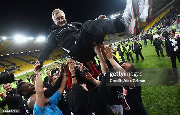 Head coach Armin Veh of Frankfurt is thrown into the air after the Second Bundesliga match between Alemannia Aachen and Eintracht Frankfurt at Tivoli...