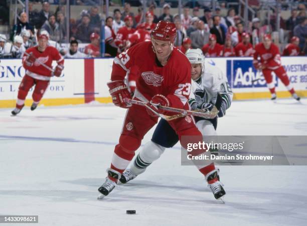 Greg Johnson from Canada and Left Wing for the Detroit Red Wings and Nelson Emerson of the Hartford Whalers during their NHL Pre Season game on 1st...