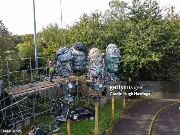 Workers begin dismantling the Mount Recyclemore sculpture at The Eden Project on October 13, 2022 in Par, England. The installation "Mount...