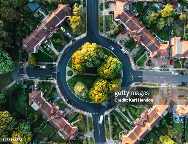 an aerial view of a traffic circle in london - city of london aerial stock-fotos und bilder