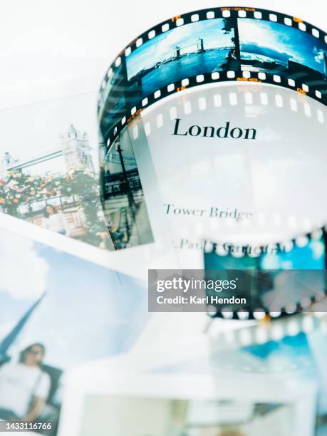 a composite image of london - instant photos and analogue film on a table - skyscraper film stock pictures, royalty-free photos & images