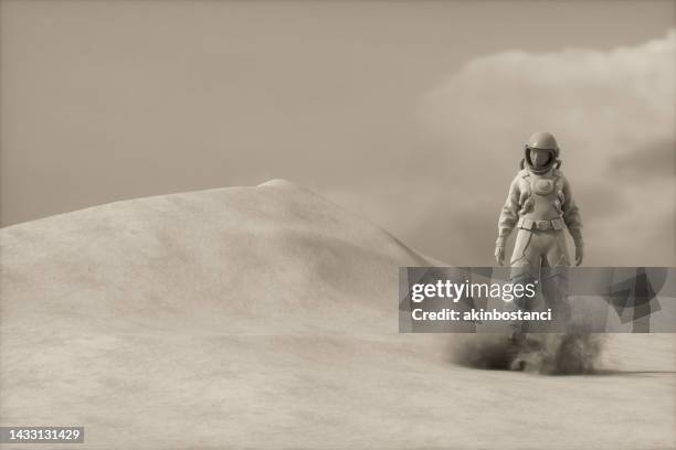 astronaut stands on another planet - mars exploration stock pictures, royalty-free photos & images