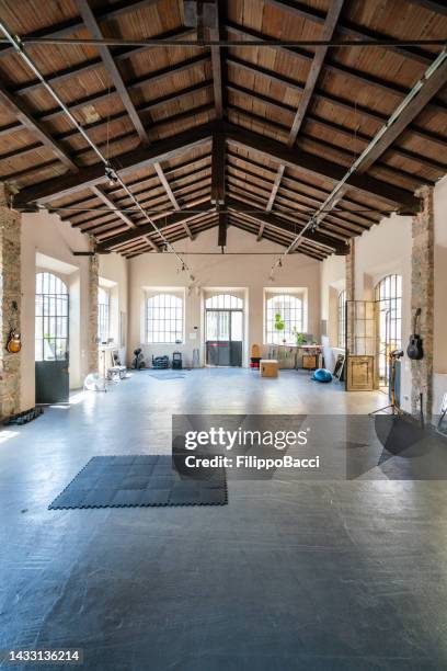 interior of an industrial loft converted into an health club and multi purpose space - multipurpose room stock pictures, royalty-free photos & images