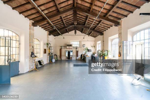 interior of an industrial loft converted into an health club and multi purpose space - multipurpose stock pictures, royalty-free photos & images