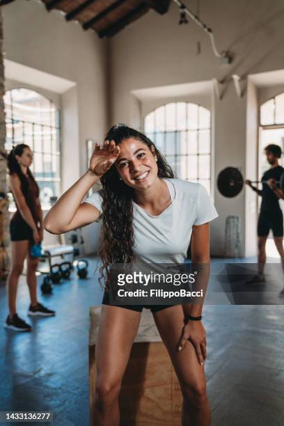 portrait of a young woman at the health club - hiit stock pictures, royalty-free photos & images