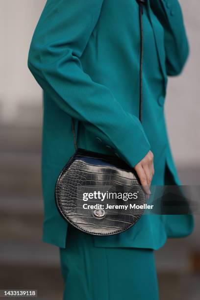 Anna Wolfers wearing a green look and a black bag on October 06, 2022 in Hamburg, Germany.