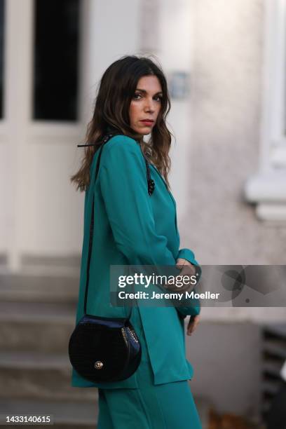 Anna Wolfers wearing a green look and a black bag on October 06, 2022 in Hamburg, Germany.