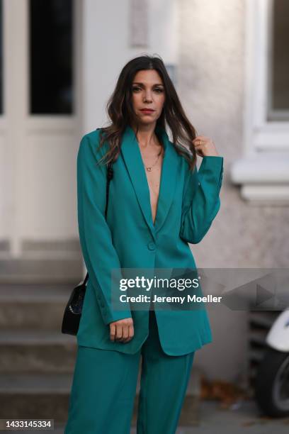 Anna Wolfers wearing a green look and a black bag on October 06, 2022 in Hamburg, Germany.