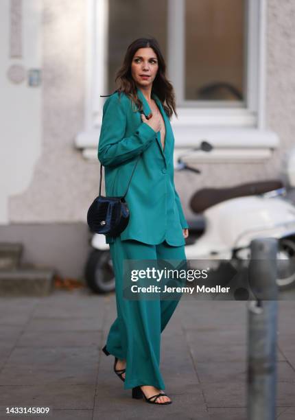 Anna Wolfers wearing a green look and a black bag on October 06, 2022 in Hamburg, Germany.