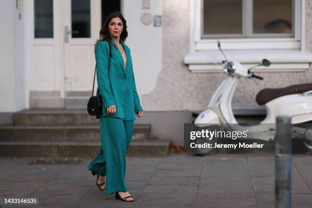 Anna Wolfers wearing a green look and a black bag on October 06, 2022 in Hamburg, Germany.