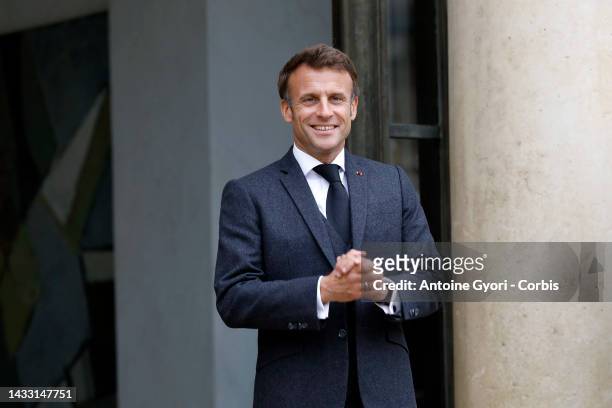 French President Emmanuel Macron wait for the arrival of the Ghanaian President Nana Akufo-Addo during a meeting at the Elysee Palace in Paris on...