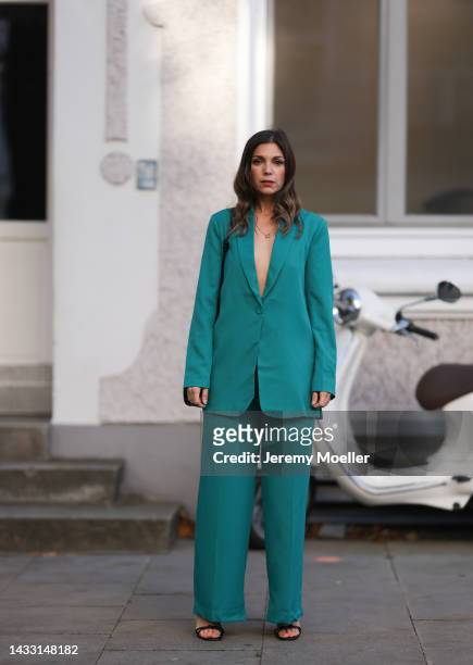 Anna Wolfers wearing a green look and a black bag on October 06, 2022 in Hamburg, Germany.