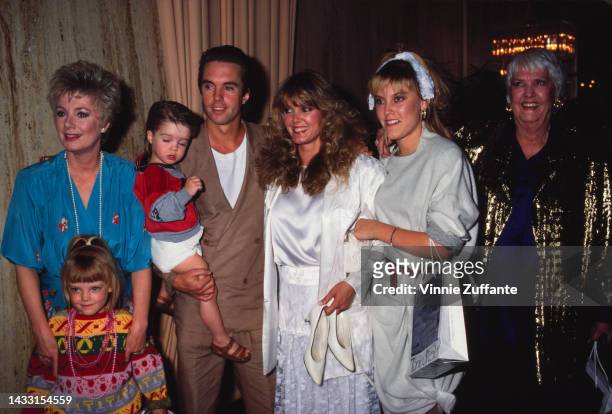 Members of the Cassidy family pose for a photograph; Shirley Jones, Shaun Cassidy, Anne Pennington, Marjorie Williams and the two children Caitlin...