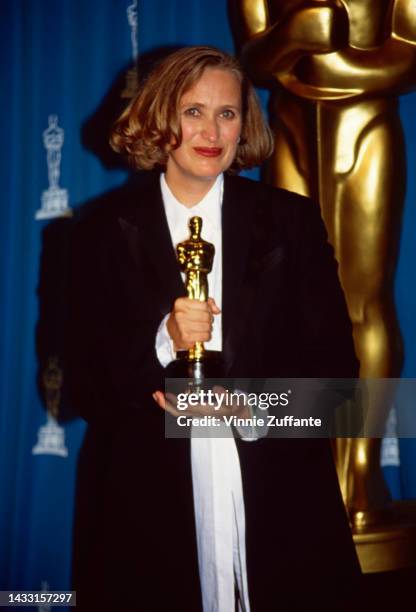 New Zealander film director Jane Campion poses with her Oscar statuette for Best Writing, Screenplay Written Directly for the Screen for her film,...