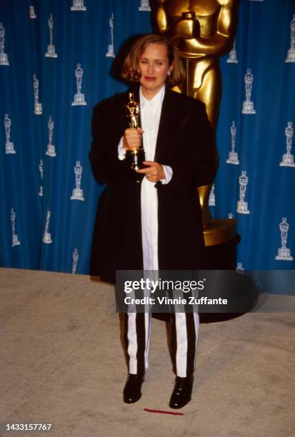 New Zealander film director Jane Campion poses with her Oscar statuette for Best Writing, Screenplay Written Directly for the Screen for her film,...