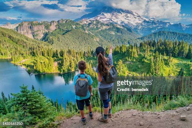 hiking mount rainier national park usa mother - child pointing stock pictures, royalty-free photos & images