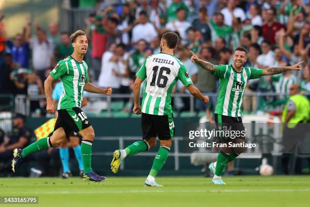 Sergio Canales of Real Betis celebrates scoring their side's first goal with teammates during the UEFA Europa League group C match between Real Betis...