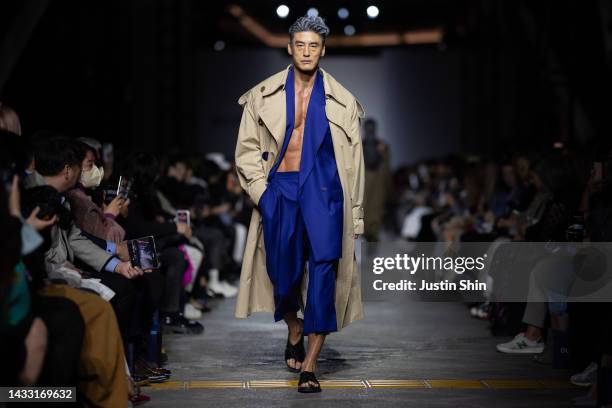 Model walks the runway during the BIG PARK show at Seoul Fashion Week SS 23 on October 13, 2022 in Seoul, South Korea.