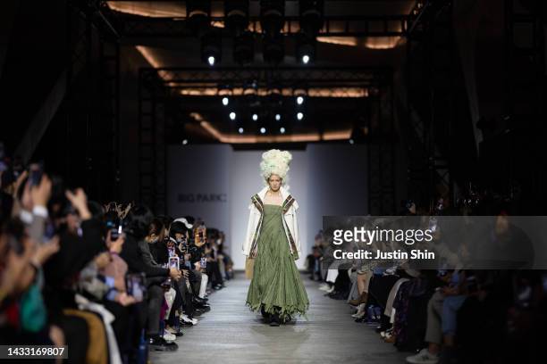 Model walks the runway during the BIG PARK show at Seoul Fashion Week SS 23 on October 13, 2022 in Seoul, South Korea.