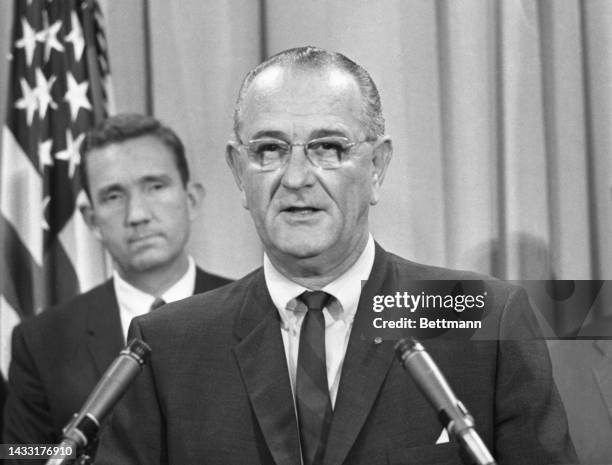 President Johnson prepares to go on nationwide radio and television at the White House to tell the nation that the government can not tolerate...