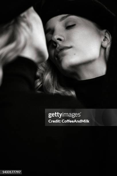 beautiful woman and her reflection - close up of beautiful young blonde woman with black hat stock pictures, royalty-free photos & images