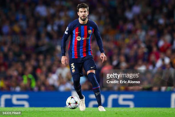 Gerard Pique of FC Barcelona runs with the ball during the UEFA Champions League group C match between FC Barcelona and FC Internazionale at Spotify...