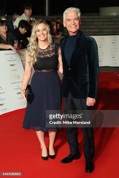 Phillip Schofield and guest attend the National Television Awards 2022 at OVO Arena Wembley on October 13, 2022 in London, England.