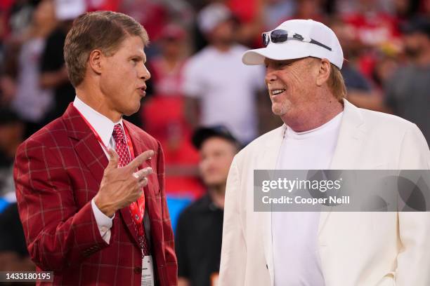 Kansas City Chiefs owner Clark Hunt and Las Vegas Raiders owner Mark Davis speak on the sidelines at GEHA Field at Arrowhead Stadium on October 10,...