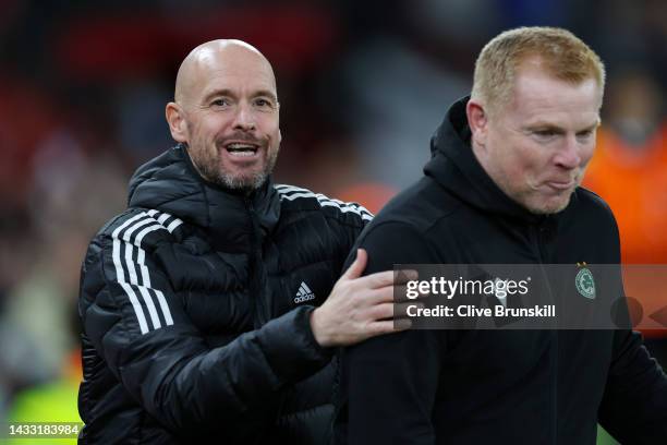 Erik ten Hag, Manager of Manchester United speaks to Neil Lennon, Head Coach of Omonia Nicosia prior to the UEFA Europa League group E match between...