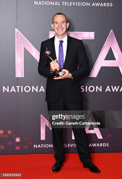 Martin Lewis with the TV Expert award in the winners' room at the National Television Awards 2022 at OVO Arena Wembley on October 13, 2022 in London,...