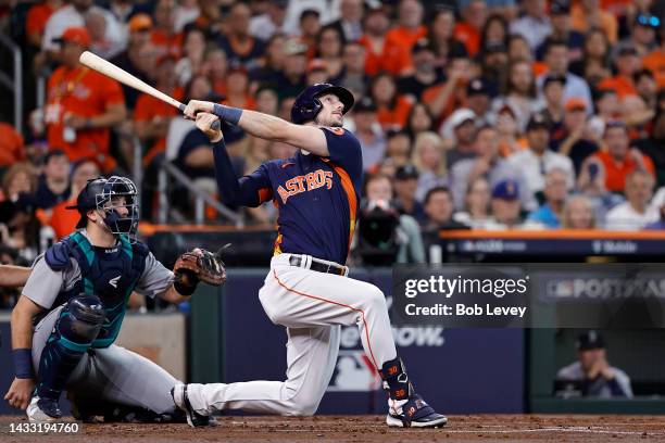 Kyle Tucker of the Houston Astros hits a home run against the Seattle Mariners during the second inning in game two of the American League Division...