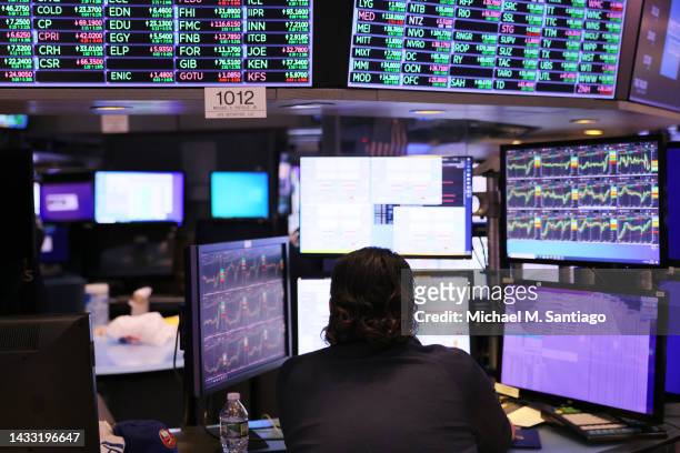 Traders work on the floor of the New York Stock Exchange during afternoon trading on October 13, 2022 in New York City. U.S. Stocks rose dramatically...