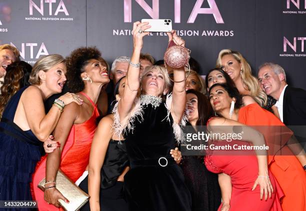 The team from 'This Morning' take a selfie with the Best Daytime award for 'This Morning', in the winners' room at the National Television Awards...