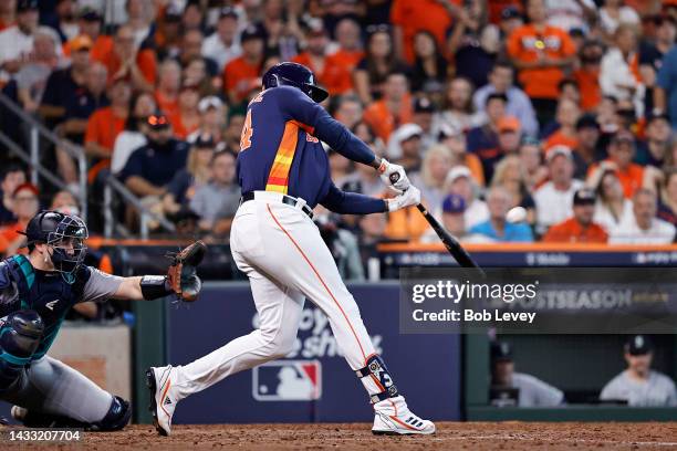 Yordan Alvarez of the Houston Astros hits a two-run home run against the Seattle Mariners during the sixth inning in game two of the American League...