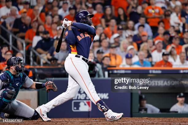 Yordan Alvarez of the Houston Astros hits a two-run home run against the Seattle Mariners during the sixth inning in game two of the American League...