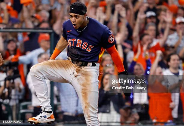 Jeremy Pena of the Houston Astros reacts after scoring a run against the Seattle Mariners during the eighth inning in game two of the American League...
