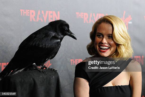 Actress Alice Eve attends the premiere of "The Raven" at Los Angeles Theatre on April 23, 2012 in Los Angeles, California.