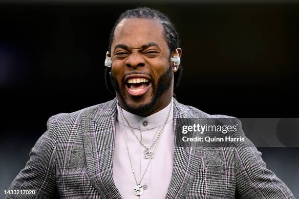 Former NFL player and Thursday Night Football broadcaster Richard Sherman looks on before the game between the Chicago Bears and the Washington...