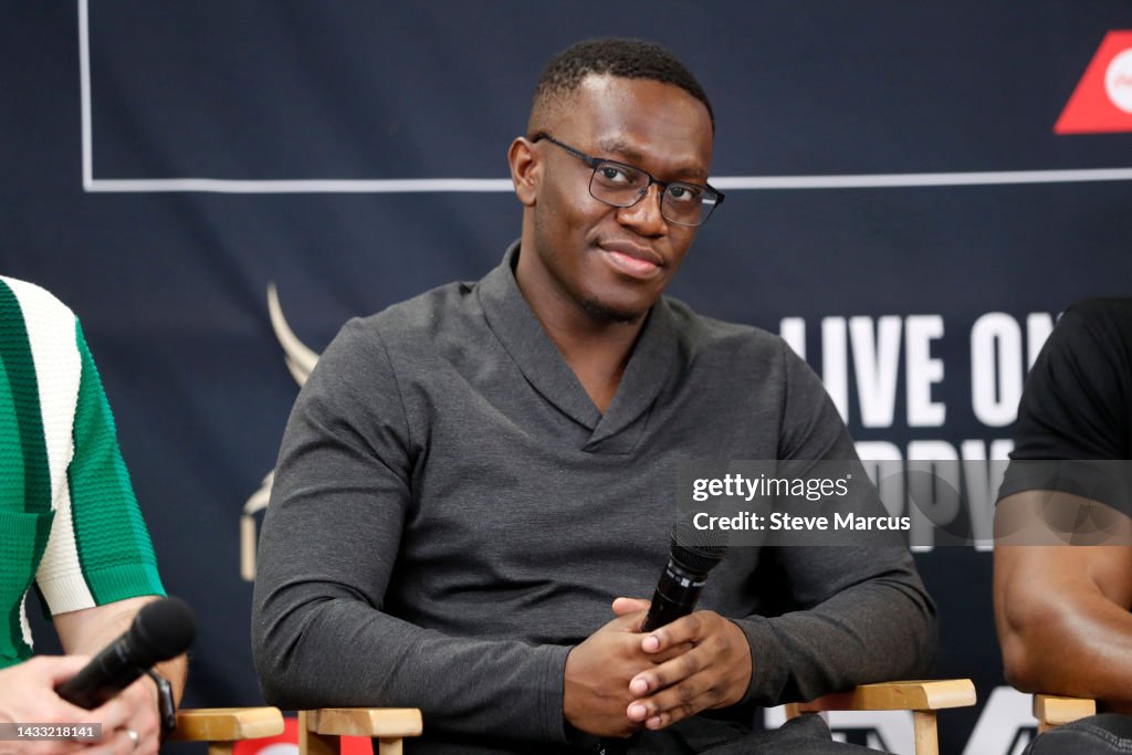 Deji Olatunji looks on during a news conference with Floyd