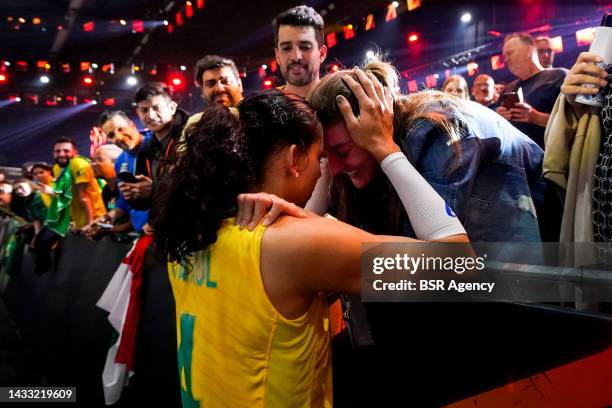 Ana Carolina Da Silva of Brazil is congratulated by her girlfriend Anne Buijs of the Netherlands during the Semi Final match between Italy and Brazil...