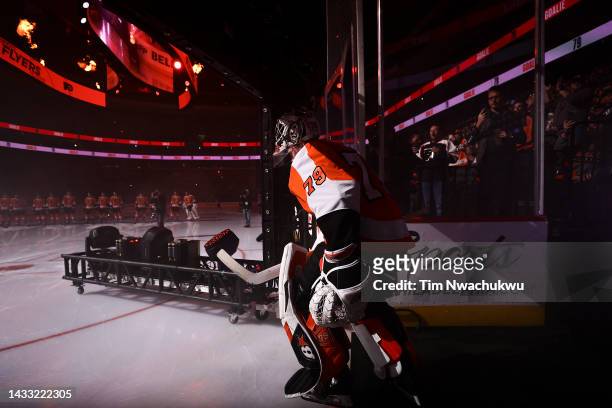 Carter Hart of the Philadelphia Flyers takes the ice against the New Jersey Devils at Wells Fargo Center on October 13, 2022 in Philadelphia,...