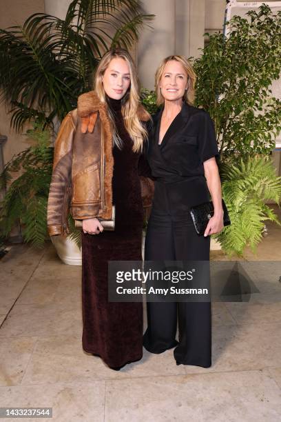 Dylan Penn and Robin Wright attend the Ralph Lauren SS23 Runway Show at The Huntington Library, Art Collections, and Botanical Gardens on October 13,...