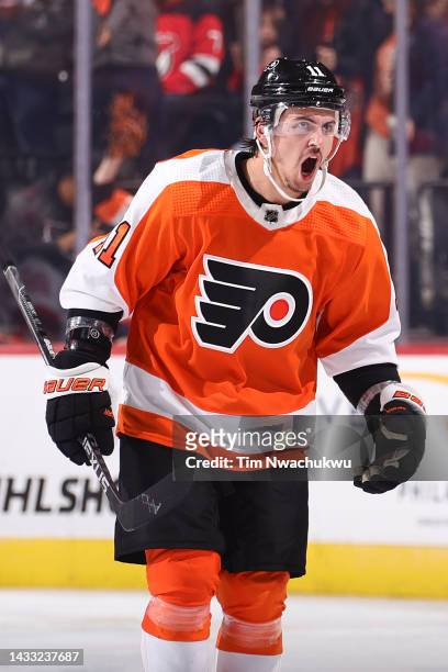 Travis Konecny of the Philadelphia Flyers reacts after scoring during the third period against the New Jersey Devils at Wells Fargo Center on October...