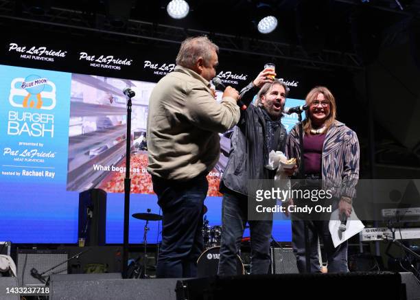 Lee Schrager, John Cusimano and Rachael Ray speak onstage at Blue Moon Burger Bash presented by Pat LaFrieda Meats and hosted by Rachael Ray during...