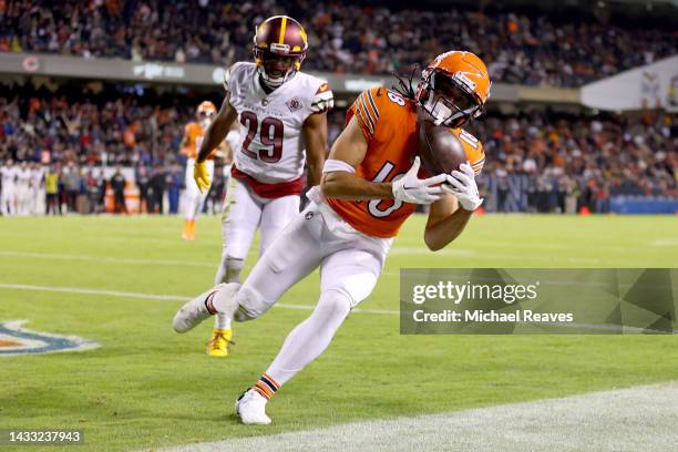 Dante Pettis of the Chicago Bears catches a pass against Kendall Fuller of the Washington Commanders during the third quarter at Soldier Field on...