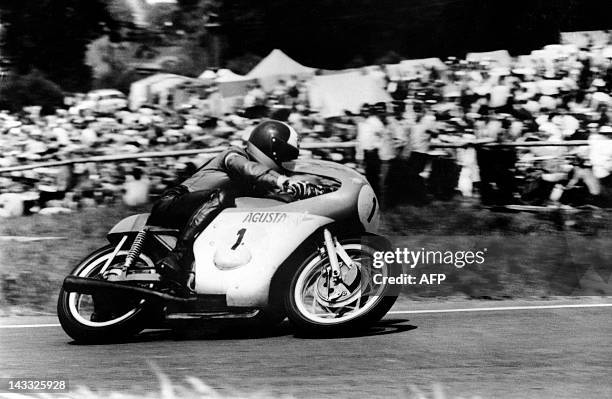 Picture taken on July 4, 1971 shows 500cc Motorcycle World Champion Giacomo Agostini from Italy riding his Agusta 500cc in Spa Francorchamps where he...