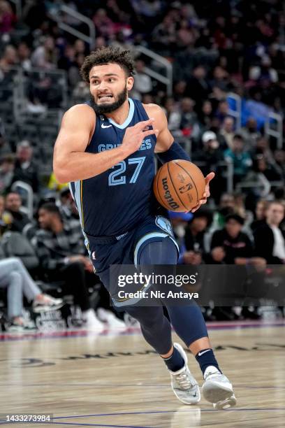 David Roddy of the Memphis Grizzlies handles the ball against the Detroit Pistons at Little Caesars Arena on October 13, 2022 in Detroit, Michigan....