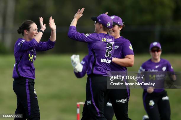 Heather Graham of the Hurricanes celebrates after taking the wicket of Phoebe Litchfield of the Thunder during the Women's Big Bash League match...